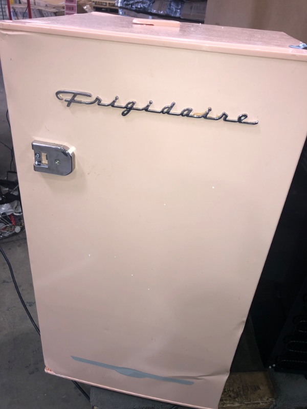 Photo 6 of *DOOR DOES NOT OPEN// DAMAGE// MULTIPLE DENTS//POWERS ON THOUGH** Frigidaire EFR376-CORAL Retro Bar Fridge Refrigerator with Side Bottle Opener, 3.2 cu. Ft, Coral
