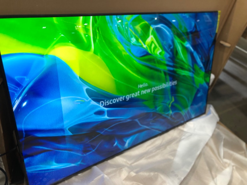 Photo 1 of DAMAGED TOP EDGE OF FRAME**SAMSUNG 65-Inch Class Crystal 4K UHD AU8000 Series HDR, 3 HDMI Ports, Motion Xcelerator, Tap View, PC on TV, Q Symphony, Smart TV with Alexa Built-In (UN65AU8000FXZA, 2021 Model)
