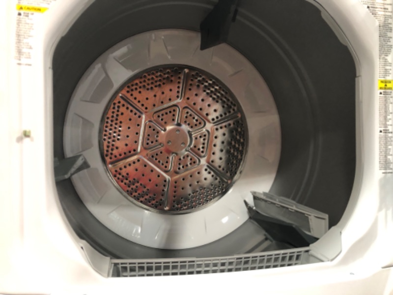 Photo 1 of COSMETIC DAMAGES**GE Gas Stacked Laundry Center with 3.8-cu ft Washer and 5.9-cu ft Dryer