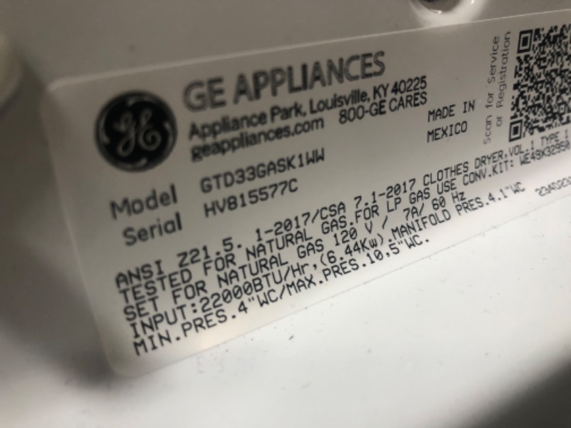 Photo 1 of SCRATCHED TOP**GE 7.2-cu ft Reversible Side Swing Door Gas Dryer (White)