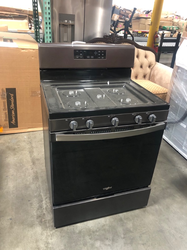 Photo 2 of Whirlpool 5.0 cu. ft. Gas Range with Self Cleaning and Center Oval Burner in Black Stainless