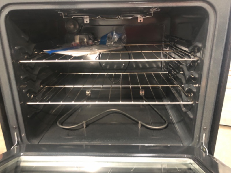 Photo 8 of LIKE NEW;SCRATCHED**Frigidaire 30-in Smooth Surface 5 Elements 5.3-cu ft Freestanding Electric Range (Fingerprint Resistant Stainless Steel)