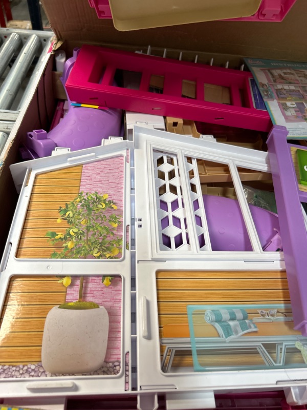 Photo 3 of Barbie DreamHouse Dollhouse with 70+ Accessories, Working Elevator & Slide, Transforming Furniture, Lights & Sounds Wheelchair Accessible Elevator