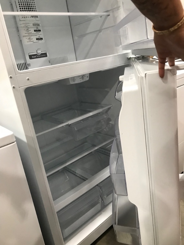Photo 6 of GE Garage Ready 19.1-cu ft Top-Freezer Refrigerator (White)