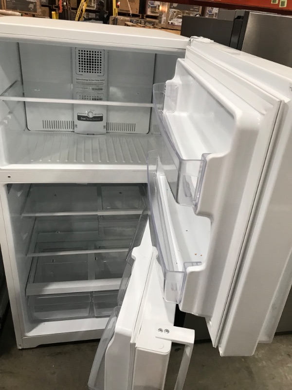 Photo 6 of GE Garage-ready 21.9-cu ft Top-Freezer Refrigerator (White)