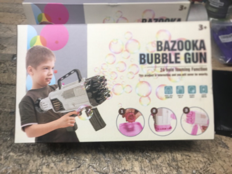 Photo 2 of Bubble Gun Machine for Adults Kids, 24 Hole Bubble Maker, Bubble Blaster Party Favors, Summer Outdoor OutsideToys, Halloween Christmas Birthday Party Gifts for Boys Girls Age 2 3 4 5+ Years Old Pink-h-1