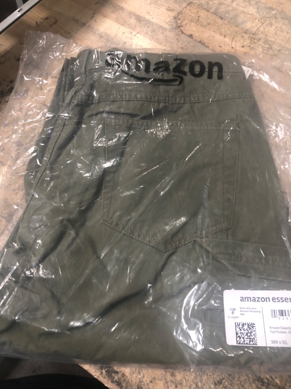 Photo 2 of Amazon Essentials Men's Carpenter Jean with Tool Pockets 36X32
