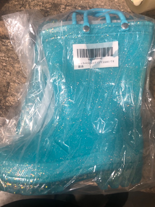 Photo 1 of BLUE RAIN BOOTS  SIZE 7  GIRLS 