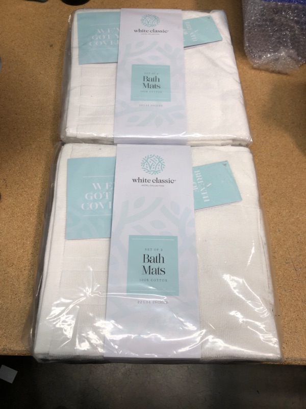 Photo 1 of 2 packs of 2 bath mats 22x34