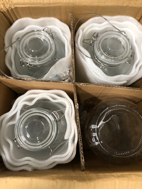 Photo 1 of Nuenen 4 Pack 1 Gallon Beverage Dispenser Glass Drink Dispenser Clear Lemonade Dispenser with Spigot 1 Gallon Glass Pitcher for Water Tea Juice Laundry Detergent Jug Jar Party Container
