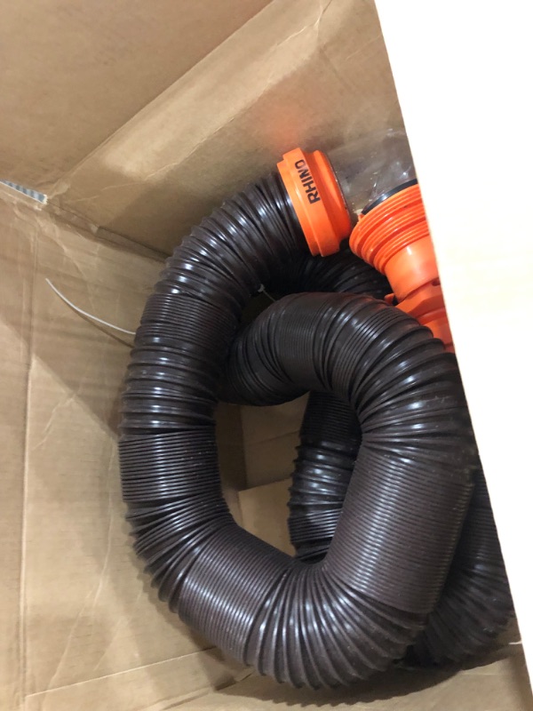 Photo 2 of Camco RhinoFLEX RV Sewer Hose Kit with Swivel Transparent Elbow and 4-in-1 Dump Station Fitting, Brown, 15 Feet (39770) 15ft Sewer Hose Kit Frustration-Free Packaging