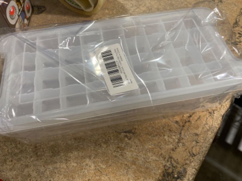 Photo 2 of **STOCK IMAGE FOR SAMPLE**
Ice Cube Tray with Lid for Freezer 64 Nuggets Ice Cubes Silicone Ice Tray with Storage Bin
