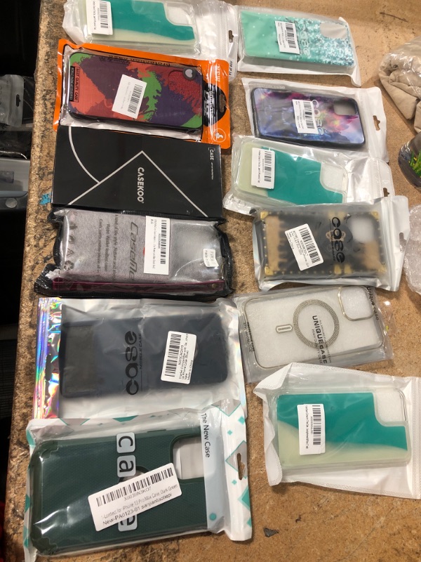 Photo 1 of 12 ITEMS, ASSORTED PHONE CASE BUNDLE