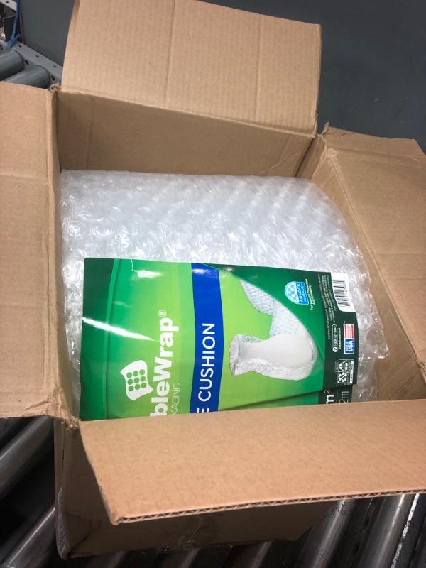 Photo 2 of Duck Brand Large Bubble Wrap Cushioning, 5/16" Bubbles for Extra Protection Packing, Shipping, and Moving, Perforated Every 12", 12" x 60' per Roll 12 in. x 60 ft.