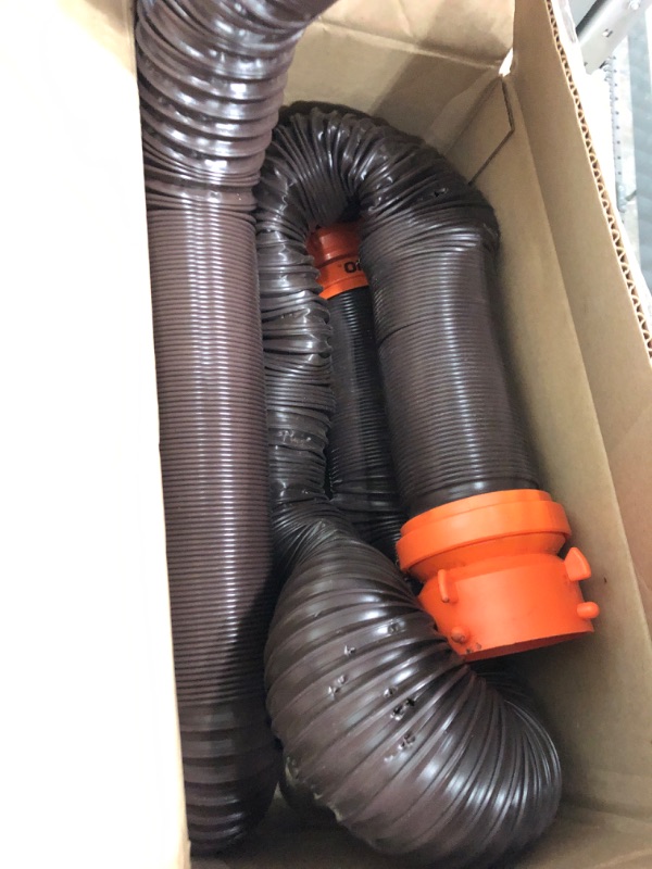 Photo 2 of Camco 20' (39742) RhinoFLEX 20-Foot RV Sewer Hose Kit, Swivel Transparent Elbow with 4-in-1 Dump Station Fitting-Storage Caps Included , Black , Brown 20ft Sewer Hose Kit Frustration-Free Packaging