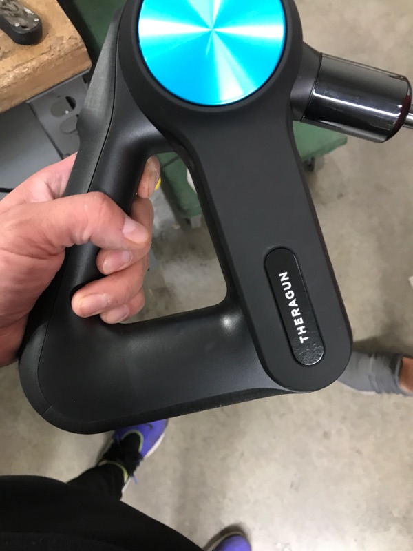 Photo 1 of TheraGun Pro - Handheld Massage Gun - Athlete Approved Bluetooth Enabled Percussion Massage Gun for Pain Relief - Deep Tissue Muscle Massager with Quietforce Technology - 4th Generation - Black Black - 4th Gen