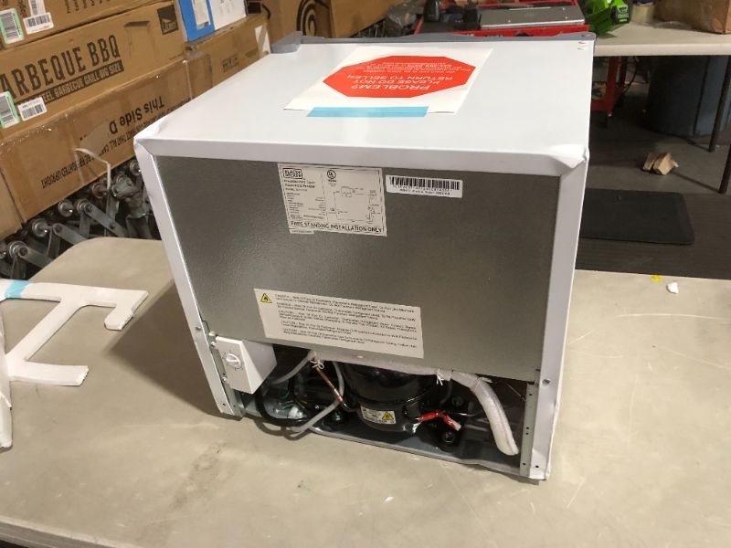 Photo 4 of ***MAJOR DAMAGE - NONFUNCTIONAL - FOR PARTS - SEE NOTES***
BLACK+DECKER 1.2 Cu. Ft. Compact Upright Freezer