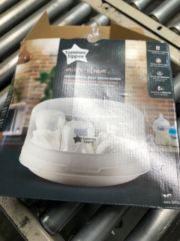 Photo 2 of 
Tommee Tippee Microsteri Microwave Steam Sterilizer for Baby Bottles and Accessories, Kills Viruses* and 99.9% of Bacteria, 4-Minute Sterilization Cycle