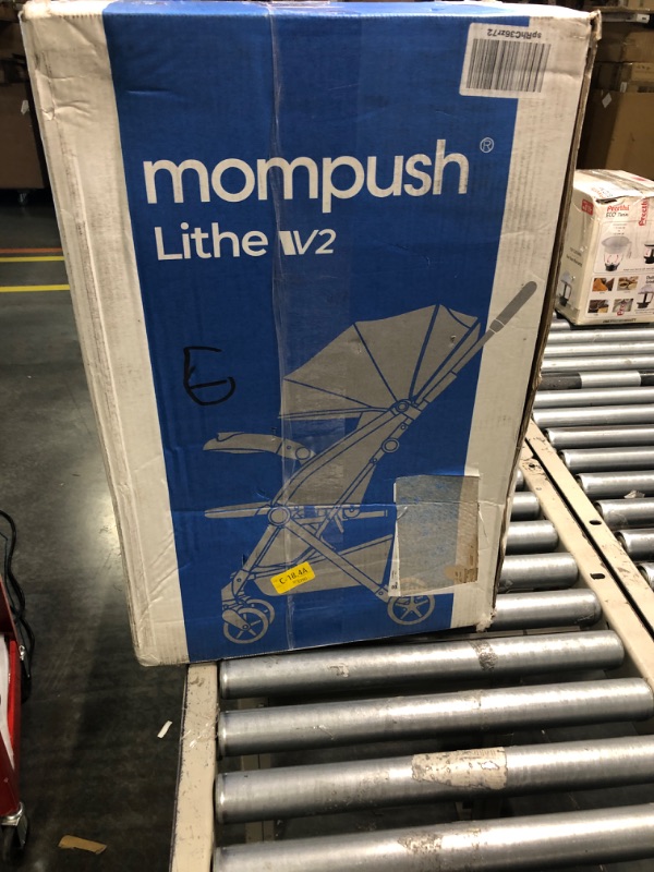Photo 1 of Mompush Lithe V2 Lightweight Stroller + Snack Tray, Ultra-Compact Fold & Airplane Ready Travel Stroller, Near Flat Recline Seat, Cup Holder, Raincover & Travelbag Included Forest