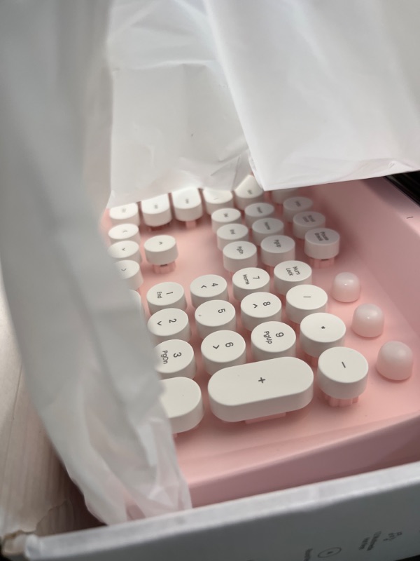 Photo 1 of YUNZII ACTTO B503 Wireless Typewriter Keyboard, Retro Bluetooth Aesthetic Keyboard with Integrated Stand for Multi-Device (B503, Baby Pink)
