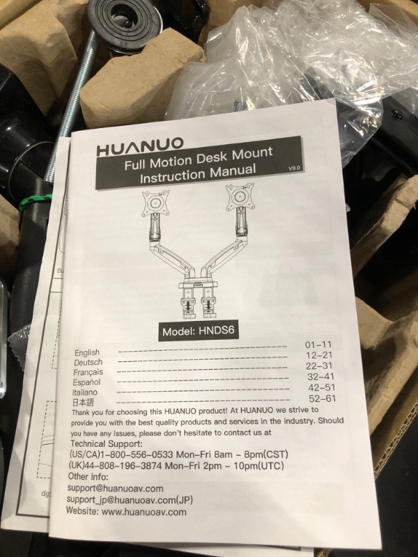 Photo 1 of HUANUO Dual Monitor Stand - Adjustable Spring Monitor Desk Mount Swivel Vesa Bracket with C Clamp