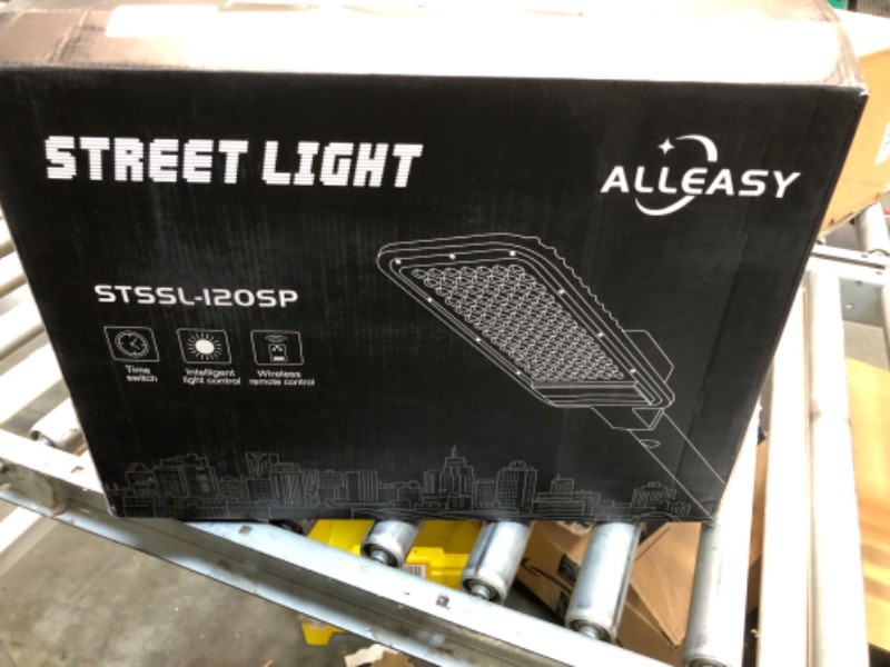 Photo 1 of AllEASY Solar Street Light Outdoor Waterproof, 120W 1580lm IP67 Solar Security Flood Lights with Motion Sensor Remote Control, Dusk to Dawn Solar Parking Lot Light for Street, Yard, Barn, Garage Black 1-Pack
