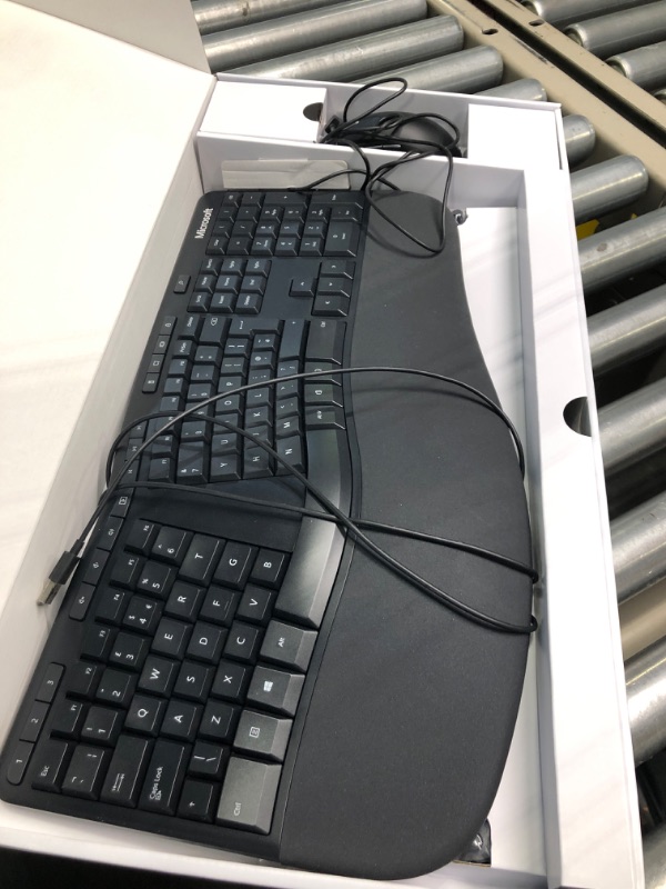 Photo 4 of Microsoft Ergonomic Desktop - Black - Wired, Comfortable, Ergonomic Keyboard and Mouse Combo, with Cushioned Wrist and Palm Support. Split Keyboard. Dedicated Office Key.
