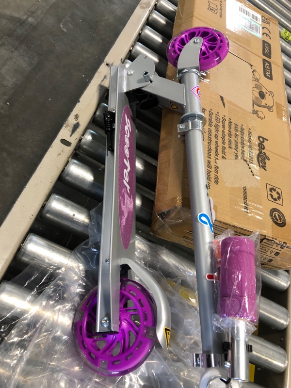 Photo 1 of BELEEV V1 Scooters for Kids, 2 Wheel Folding Kick Scooter for Girls Boys, 3 Adjustable Height, Light Up Wheels, Lightweight Scooter with Sturdy Frame, Kickstand for Children 3 to 12 Years Old Purple