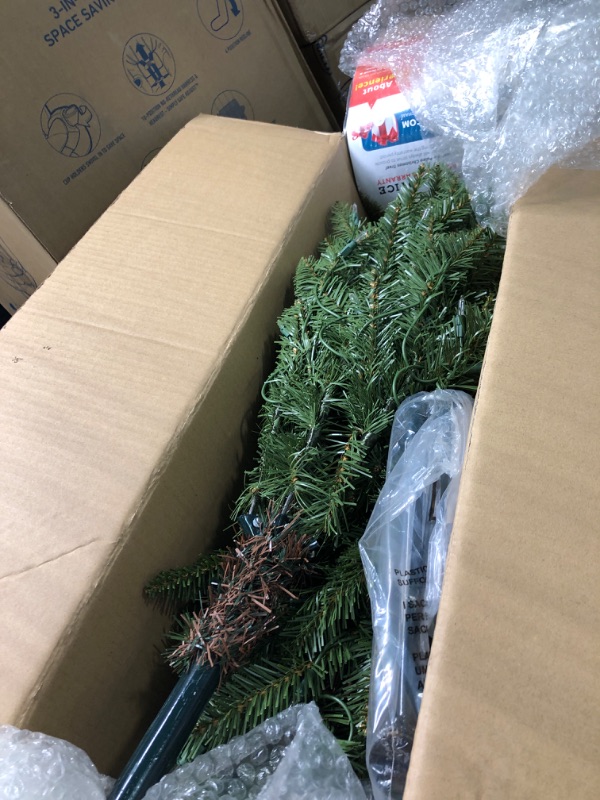 Photo 1 of 4.5 ft. Pre-Lit Incandescent Slim Fraser Fir Artificial Christmas Tree with 150 UL Clear Lights