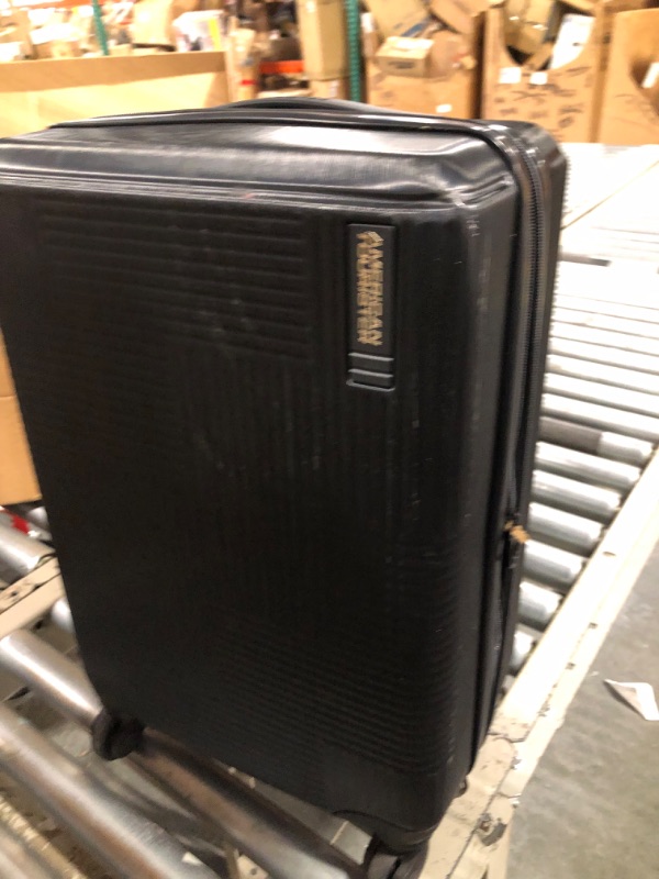 Photo 1 of American Tourister Stratum XLT Expandable Hardside Luggage with Spinner Wheels, Jet Black, Carry-On 21-Inch Carry-On 21-Inch Jet Black