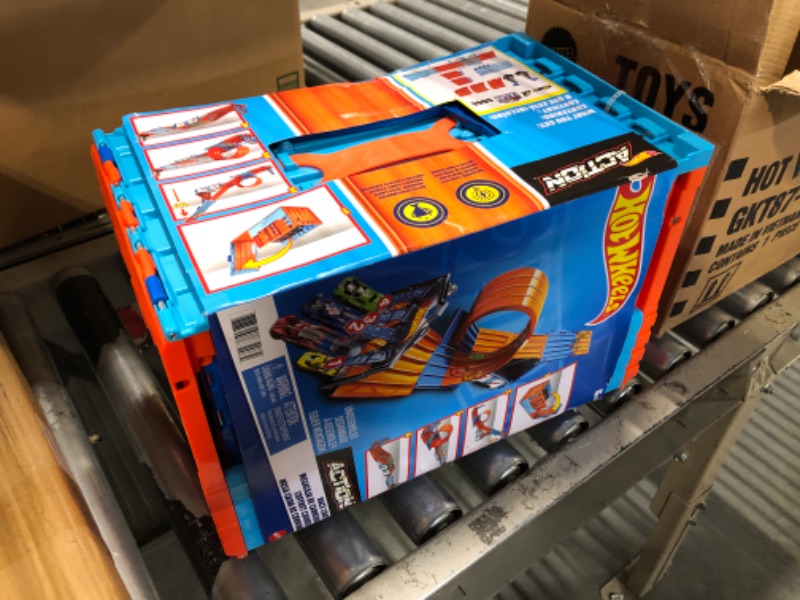 Photo 2 of ?€?Hot Wheels Race Crate with 3 Stunts in 1 Set Portable Storage Ages 6 to 10 [Amazon Exclusive] & Set Of 10 1:64 Scale Toy Trucks And Cars For Kids And Collectors (Styles May Vary) [Amazon Exclusive] Race Tracks + Hot Wheels Set Of 10