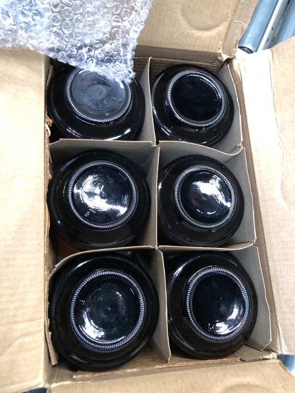 Photo 1 of 32 oz Amber Glass Pella Growler Bottle with Black Plastic Caps with Foam Liner (6 pack)