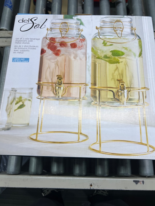 Photo 2 of Elegant Home Set of Two (2) Quality Clear Glass Each (1) Gallon Each Glass Bail & Trigger Locking Lid Beverage Dispenser with Spout on Gold Metal Stand.