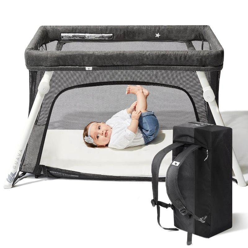 Photo 1 of Guava Family Lotus Travel Crib | Certified Baby Safe Portable Crib with Mattress | Folding Portable Playpen for Babies & Toddlers | Play Yard with Lightweight Backpack Design | Compact Baby Travel Bed
