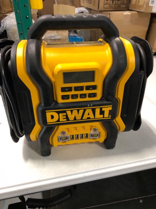 Photo 2 of DEWALT DXAEPS14 1600 Peak Battery Amp 12V Automotive Jump Starter/Power Station with 500 Watt AC Power Inverter, 120 PSI Digital Compressor, and USB Power , Yellow