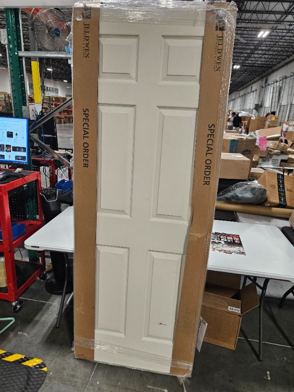 Photo 1 of 30 in. x 80 in 6 Panel door can be used for right or left handed 