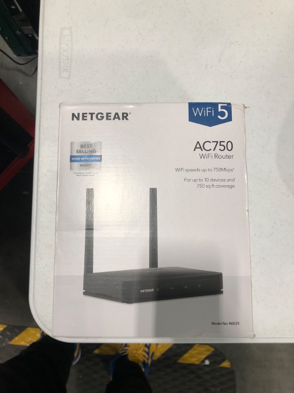 Photo 1 of NETGEAR Dual Band WiFi Router (R6020) – AC750 Wireless Speed (Up to 750Mbps), Coverage up to 750 sq. ft., 10 Devices, 4 x Fast Ethernet Ports