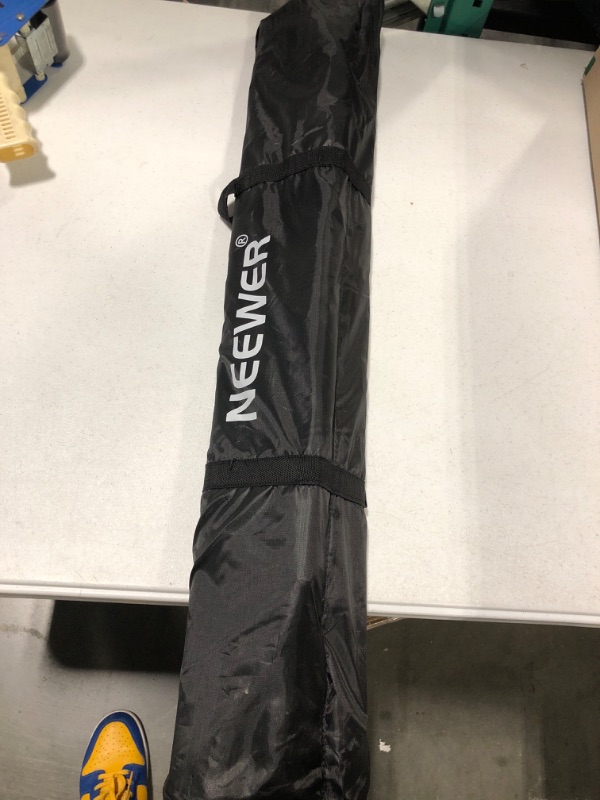 Photo 1 of Neewer Photo Studio Backdrop Support System, 10ft/3m Wide 6.6ft/2m High Adjustable Background Stand with 4 Crossbars, 6 Backdrop Clamps, 2 Sandbags, and Carrying Bag for Portrait & Studio Photography Black