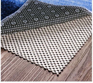 Photo 1 of **USED** Non Slip Area Rug Pad Gripper - 10X14 Strong Grip Carpet pad for Area Rugs and Hardwood Floors, Provides Protection and Cushion 10'X14'