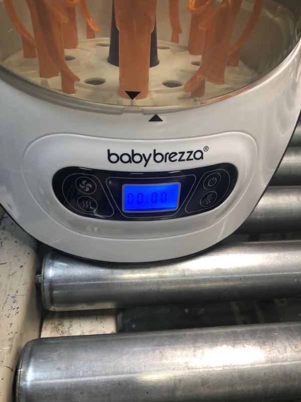 Photo 1 of Baby Brezza Baby Bottle Sterilizer and Dryer Machine – Electric Steam Sterilization - Universal Fit - Pacifiers, Glass, Plastic, and Newborn Feeding Bottles
