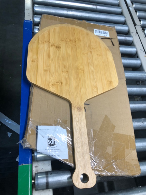 Photo 3 of Azlan's Essentials Wood Pizza Peel 16 Inch - Sustainably Sourced Wooden Bamboo Pizza Paddle with Ergonomic Handle For Baking Homemade Pizza and Bread, No Split or Cracks, Extra Large.
