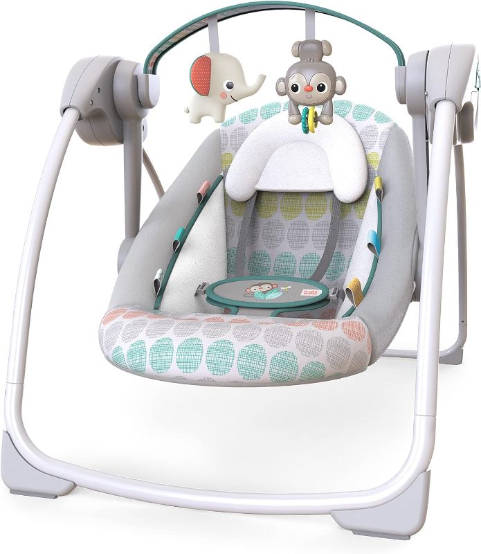 Photo 1 of Bright Starts Portable Automatic 6-Speed Baby Swing with Adaptable Speed, Taggies, Music, Removable -Toy Bar, 0-9 Months 6-20 lbs (Whimsical Wild)