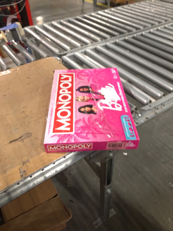 Photo 1 of Monopoly: Barbie Edition Board Game, Ages 8+, 2-6 Players, Fun Family Games for Kids and Adults, with 6 Barbie-Themed Pink Zinc Tokens, Kids Gifts