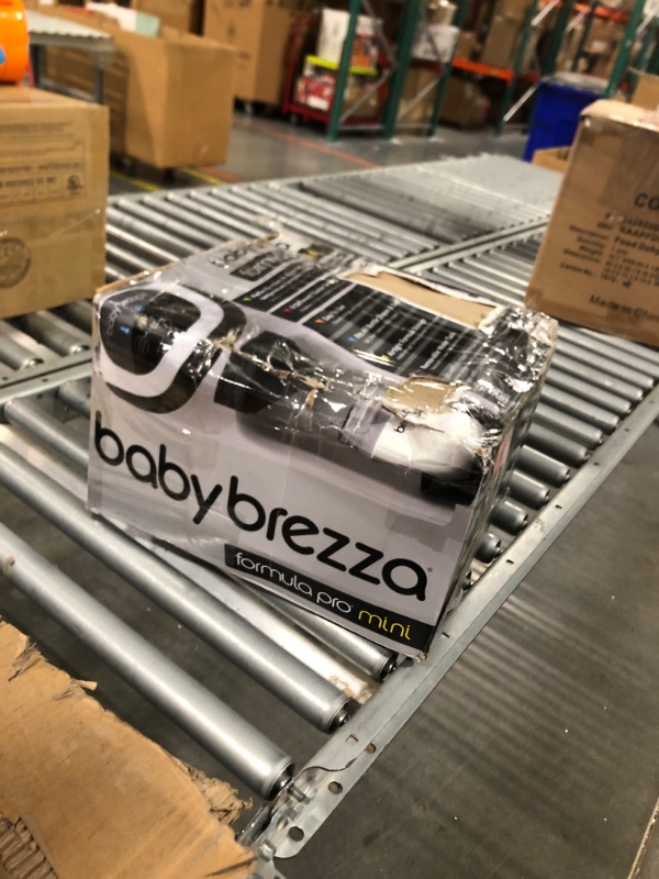 Photo 4 of Baby Brezza Formula Pro Mini Baby Formula Maker – Small Baby Formula Mixer Machine Fits Small Spaces and is Portable for Travel– Bottle Makers Makes The Perfect Bottle for Your Infant On The Go Formula Pro Mini Dispenser Machine