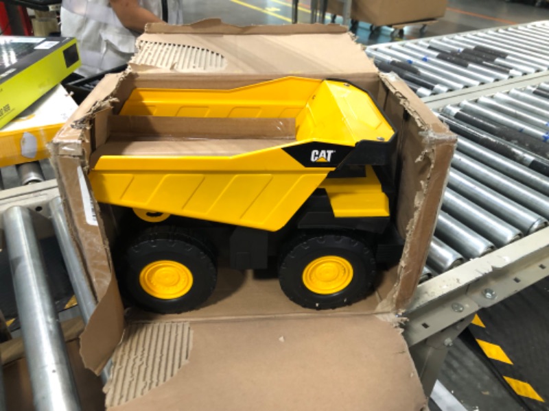 Photo 1 of Cat Construction Steel Toy Dump Truck, Yellow Steel Dump Truck