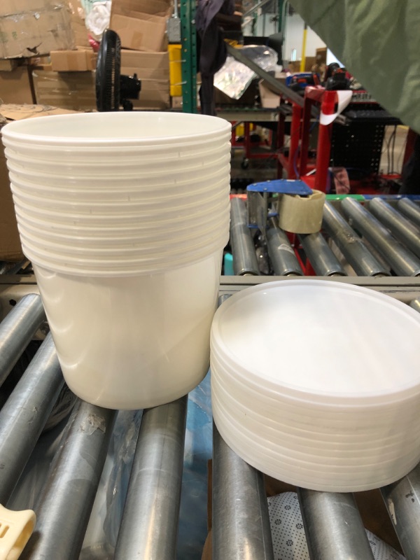 Photo 1 of 12 white storage buckets.