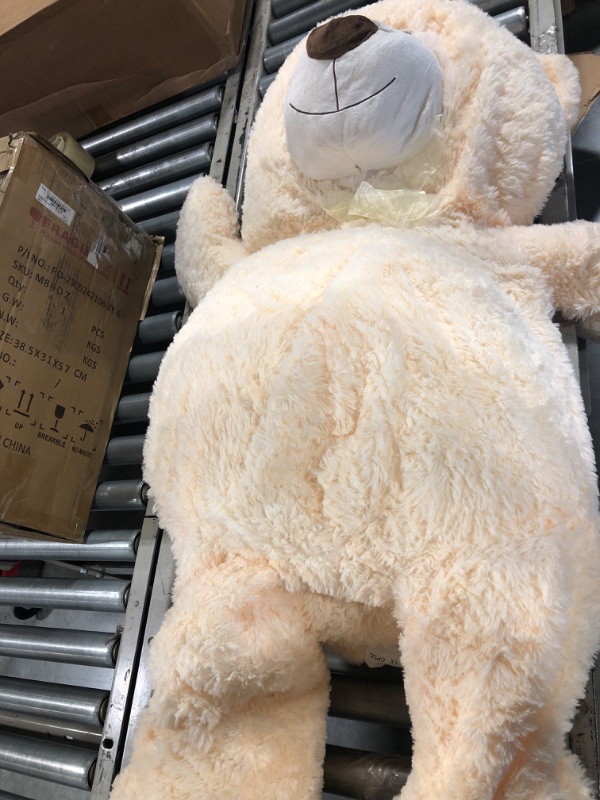 Photo 1 of DOLDOA Giant Teddy Bear Stuffed Animal 51in, Big Teddy Bear Stuffed Bears, Calming Large Teddy Bear Plush for Kids, Girlfriend, Baby Shower, Beige 51 inch Beige