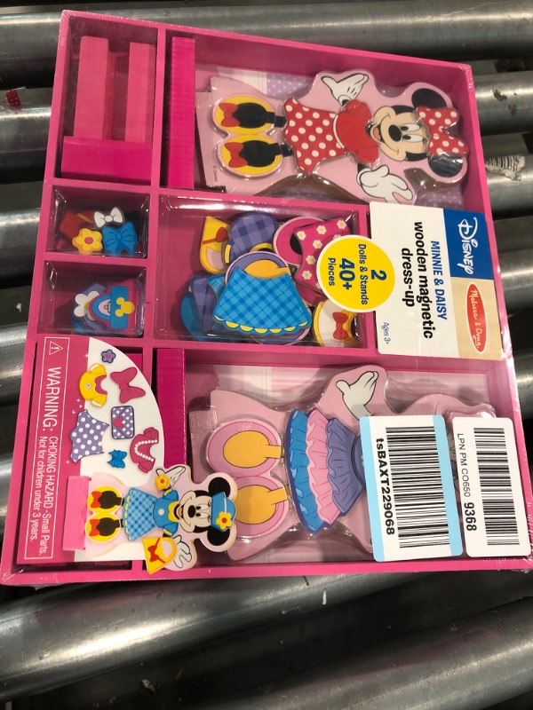 Photo 1 of Melissa & Doug Disney Minnie Mouse and Daisy Duck Magnetic Dress-Up Wooden Doll Pretend Play Set (40+ pcs) & Disney Minnie Mouse Mix and Match Dress-Up Wooden Play Set (18 pcs) Minnie & Daisy Play Set + Mix and Match Dress-Up