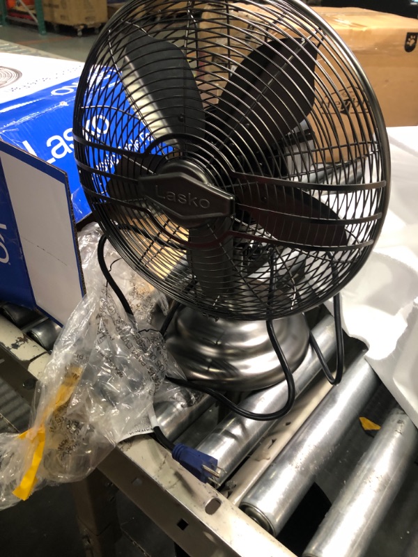 Photo 1 of Lasko 12" Classic Metal Table Fan - 12" Diameter - 3 Speed - Quiet, Carrying Handle, Oscillating - 17.3" Height x 13.3" Width - Metal
