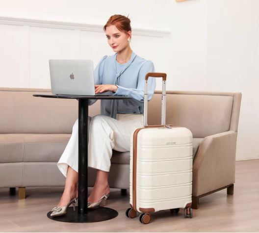 Photo 1 of Delsey Paris Chatelet 21" Upright Carry-On Spinner - Champagne